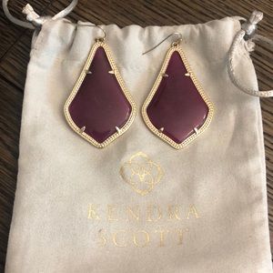 Kendra Scott Alex earrings in gold and maroon stone